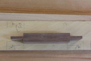 Using the layout stick, you can easily mark the shoulders for a mortise-and-tenon joint.