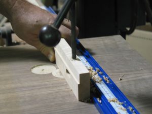 Drill the holes in the fence for the threaded inserts.