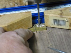 Drill the rub stock for screw.