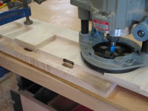 Routing the beam mortise.
