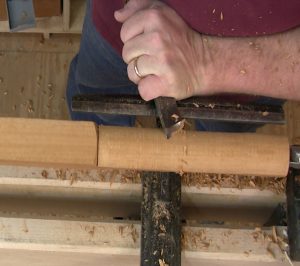 Raising and lowering the handle of the skew allows you to control the depth of cut.