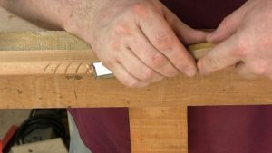 Rounding the convex lobes of the gadrooning is best achieved with a bench chisel using a slicing cut.