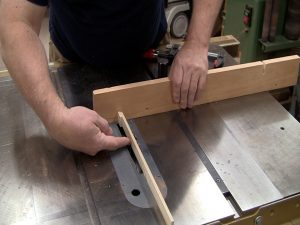 Use the remainder of the strip of material for the pin as a spacer to setup the jig.