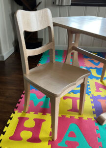 A child's chair set at an angle.